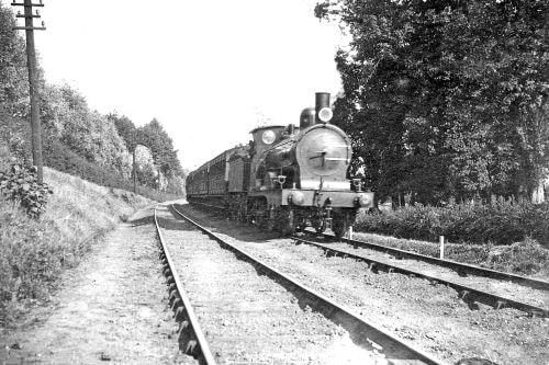 This train is on its way from Brundall towards Norwich in the early 1900s